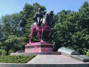 Protesters vandalized the King Edward VII Equestrian Statue at Queen's Park in Toronto, Ont., on Saturday, July 18, 2020.