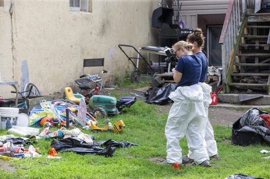  Forensics officers at the scene where the body of Grant Norton was found.