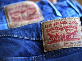 The Levi's logo is displayed on a pair of jeans.