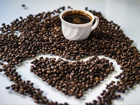 Heart shape made of perfect coffee beans.