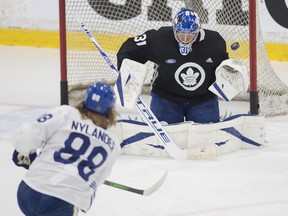 Maple Leafs goaltender Frederik Andersen makes a save on forward William Nylander at training camp on Tuesday.