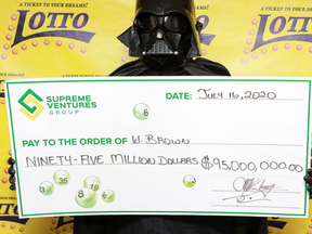 "Darth Vader" also known as W. Brown, claims a big lottery win in Jamaica.