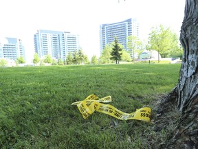 Only remounts of yellow police tape and shattered window glass from a minivan remain at the crime scene on Research Rd. in the upper Thorncliffe Park area where a man in his 20s was shot dead during a drive-by shooting Tuesday night around 7:30 p.m. on Wednesday June 10, 2020.