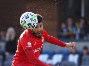 Toronto FC midfielder Alejandro Pozuelo heads the ball against the San Jose Earthquakes during the second half at Earthquakes Stadium.