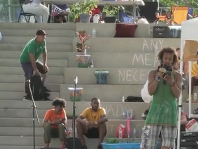 Javon Martin, a photographer who was covering a peaceful sit-in protest at Nathan Phillips Square on Sunday, said his equipment was taken by a man captured on video.