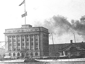 The Toronto Harbour Commission's steam yacht Bethalma and another unidentified craft are seen moored in front of the Commission's new building in 1920. As for the smoke emanating from the many factory chimney stacks around the city, it was said such copious volumes of smoke meant that business in those factories was particularly good.