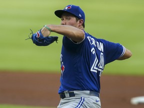 Toronto Blue Jays starter Nate Pearson throws against the Atlanta Braves on Thursday night.