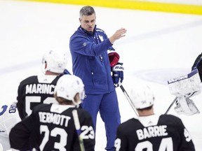 Toronto Maple Leafs' head coach Sheldon Keefe instructs the team on the next drill during the second day training camp in Toronto on Tuesday, July 14.