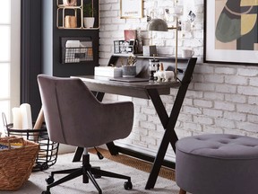 Creating a study or work area that visually blends with your decor is a smart way to integrate a workspace into your home. Wood Desk with USB and plug ports, $299, HOMESENSE
