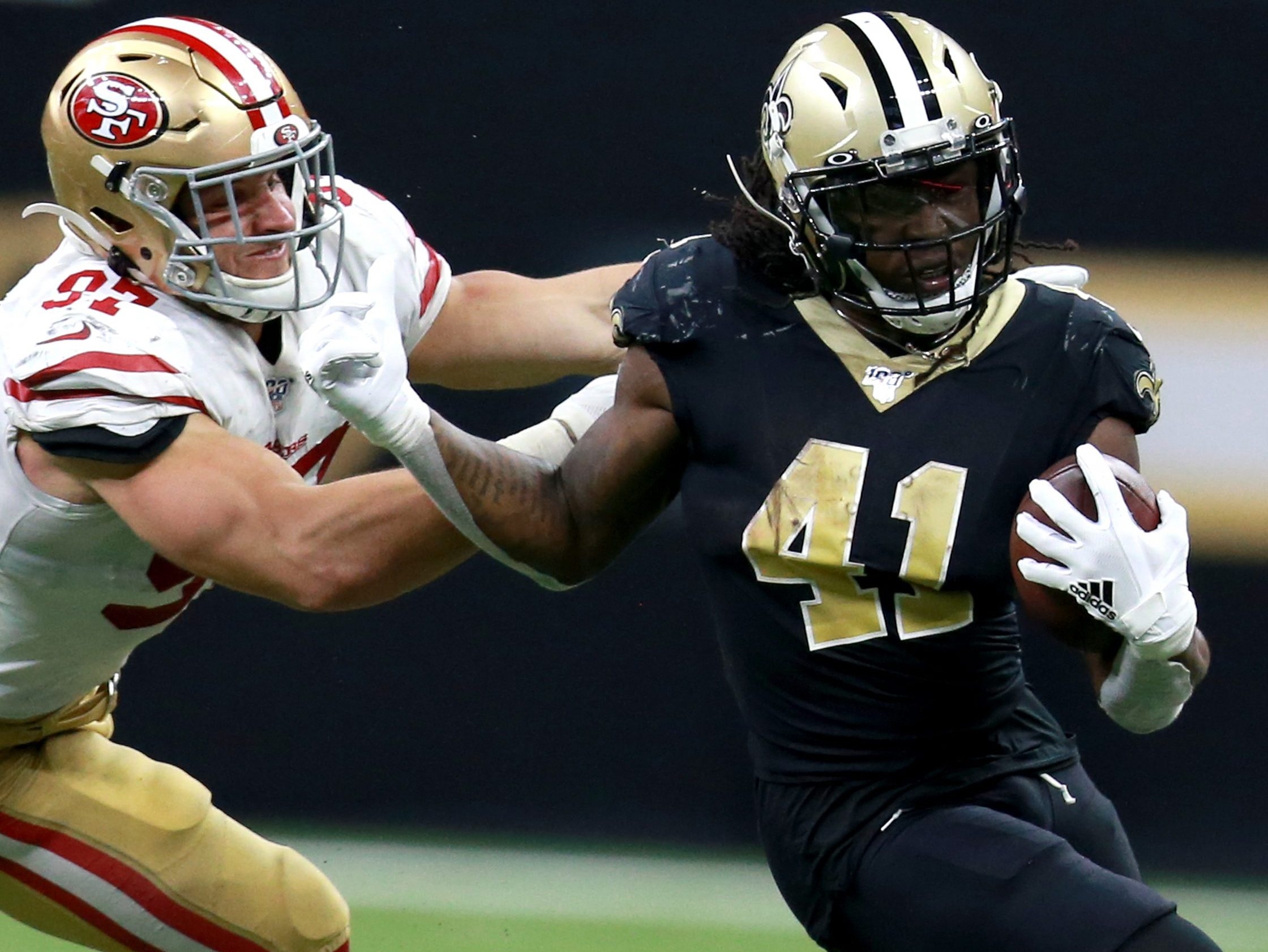 Saints' Alvin Kamara not present at training camp, absence believed to be  contract related, per report 