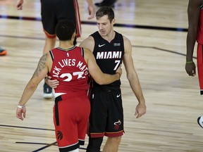 Raptors guard Fred VanVleet (left) and Miami Heat counterpart Goran Dragic both had great games on Monday.