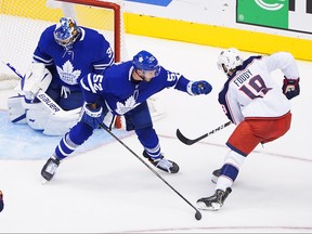Liam Foudy of the Columbus Blue Jackets scores a third period goal at 11:40 past Frederik Andersen, left, of the Toronto Maple Leafs in Game Five of the Eastern Conference Qualification Round prior to the 2020 NHL Stanley Cup Playoffs at Scotiabank Arena on August 9, 2020 in Toronto.