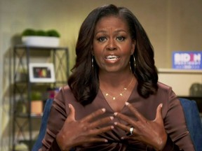 Former first lady Michelle Obama speaks in a frame grab from the live video feed of the all virtual 2020 Democratic National Convention as participants from across the country are hosted over video links to the originally planned site of the convention in Milwaukee, Wis., Aug. 17, 2020.