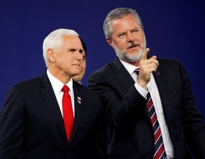 Jerry Falwell Jr. and U.S. Vice President Mike Pence prepare to leave at the end of the school’s commencement ceremonies in Lynchburg, Va, May 11, 2019.