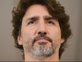 CP-Web.  Prime Minister Justin Trudeau holds a press conference as he visits the Public Health Agency of Canada during the COVID-19 pandemic in Ottawa on Friday, July 31, 2020. THE CANADIAN PRESS/Sean Kilpatrick ORG XMIT: SKP105