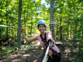 The Treetop Trekking zip-lining experience is fun and safe for all ages at Horseshoe Resort.