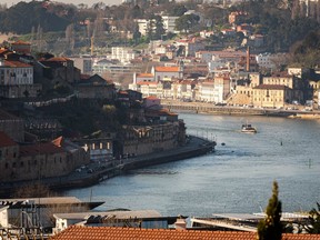 A rabelo boat plying the Douro river in Porto, Portugal on Feb. 22, 2020