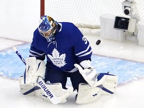 Maple Leafs goalie Frederik Andersen is unable to stop a shot from Blue Jackets forward Cam Atkinson in the third period in Game One of the Eastern Conference Qualification Round prior to the 2020 NHL Stanley Cup Playoffs at Scotiabank Arena in Toronto, Sunday, Aug. 2, 2020.