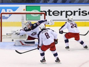 Blue Jackets goalie Joonas Korpisalo allows a goal by Maple Leafs centre Auston Matthews in Game 2 of their qualifying series. GETTY IMAGES