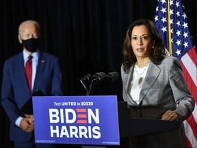 Democratic presidential nominee Joe Biden (left) and vice presidential running mate Kamala Harris hold a press conference after receiving a briefing on COVID-19 in Wilmington, Delaware, on August 13, 2020.