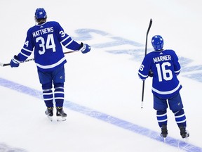 Auston Matthews and Mitch Marner of the Maple Leafs look on following their lose to the Columbus Blue Jackets 3-0 in Game Five of the Eastern Conference Qualification Round prior to the 2020 NHL Stanley Cup Playoffs at Scotiabank Arena on August 9, 2020 in Toronto, Ontario.