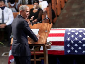 Former U.S. president Barack Obama addresses the service during the funeral of late U.S. Congressman John Lewis, a pioneer of the civil rights movement and long-time member of the U.S. House of Representatives who died July 17, at Ebeneezer Baptist Church in Atlanta, Georgia, July 30, 2020.