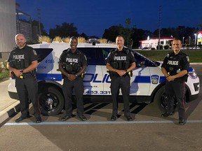 Peel cops Cst. Ihor Palchynskyy, Cst. Alvin Bailey, Sgt. Shaun Stanley and Cst. Martin Boreczek prevented a seven-year-old boy from falling out of a sixth floor balcony in Mississauga.