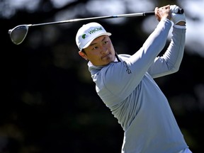 Haotong Li plays his shot from the 14th tee during the second round of the 2020 PGA Championship golf tournament at TPC Harding Park on Aug. 7, 2020.