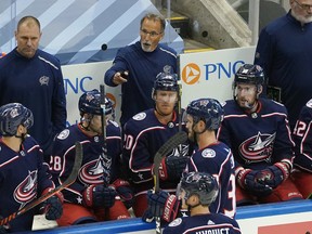 Blue Jackets head coach John Tortorella (centre) took some shots at the media in Toronto after Columbus eliminated Toronto from their play-in series on Sunday night.