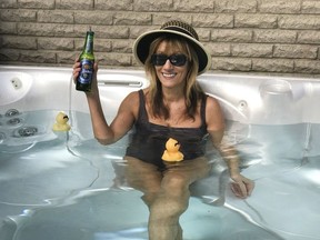 Larysa Bolde enjoys the hot tub on the "ship" at her home.