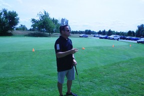Christopher de Laat delivers a lesson to beginner golfers at Mayfield Golf Club in Caledon East, Ont. RUTH DEMIRDJIAN DUENCH