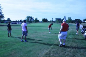 Beginner golfers take part in a lesson at Mayfield Golf Club in Caledon East, Ont.