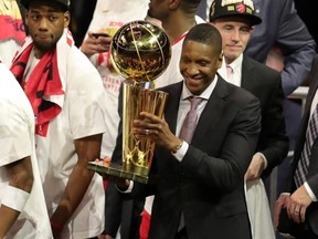 Raptors president Masai Ujiri celebrates with the Larry O'Brien Championship Trophy after defeating the Golden State Warriors in the NBA Finals in 2019. USA TODAY