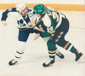 Maple Leafs’ Wendel Clark pummels Minnesota’s Dave Mackey at Maple Leaf Gardens back in the day. Clark says the current Leafs are missing that killer instinct to close series. CRAIG ROBERTSON/SUN FILE