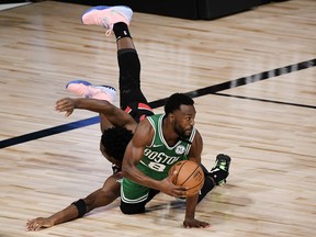 Raptors' OG Anunoby tries to defend Celtics' Kemba Walker during Thursday's Game 3.
