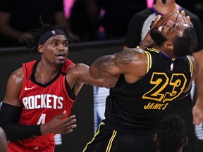 Houston Rockets guard Danuel House fouls  LeBron James during the playoff series between the Houston Rockets and Los Angeles Lakers in Orlando. House got himself booted out of the bubble for allegedly allowing an illegal female guest into his room for multiple hours.