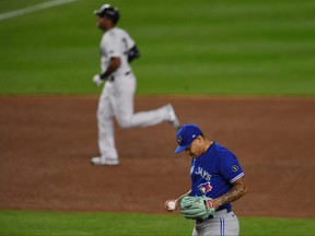 Taijuan Walker of the Toronto Blue Jays reacts after conceding a home run to Aaron Hicks of the New York Yankees during the second inning at Yankee Stadium on Sept. 15, 2020 in the Bronx borough of New York City.