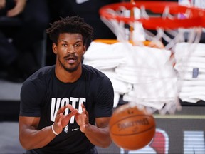 Jimmy Butler of the Miami Heat warms up prior to the start of the game against the Los Angeles Lakers in Game One of the 2020 NBA Finals on Wednesday night.