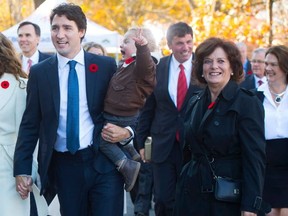 In this Nov. 4, 2015 file photo, Prime Minister Justin Trudeau -- holding his son, Xavier -- is pictured with his mom, Margaret Trudeau.
