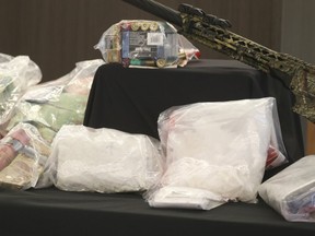 Halton Regional Police show the drugs and firearms they seized in Project Mover at a press conference on Sept. 28, 2020.