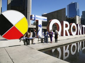 The new permanent Toronto sign is seen outside City Hall on Friday, September 18, 2020.