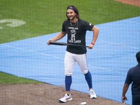 Toronto Blue Jays shortstop Bo Bichette (11) waiting to take batting practice prior to the game against the Boston Red Sox at Sahlen Field Centre.