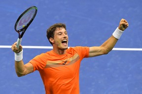 Pablo Carreno Busta of Spain celebrates winning the fifth set and match against Denis Shapovalov of Canada in the men’s singles quarter-finals match on day nine of the 2020 U.S. Open tennis tournament at USTA Billie Jean King National Tennis Center.