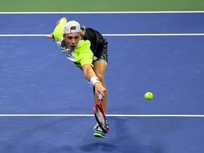 Denis Shapovalov of Canada hits the ball against Pablo Carreno Busta of Spain in the menÕs singles quarter-finals match on day nine of the 2020 U.S. Open tennis tournament at USTA Billie Jean King National Tennis Center on Sept 8, 2020.
