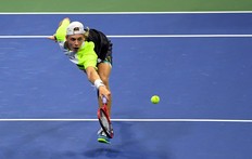 Denis Shapovalov of Canada hits the ball against Pablo Carreno Busta of Spain in the menÕs singles quarter-finals match on day nine of the 2020 U.S. Open tennis tournament at USTA Billie Jean King National Tennis Center on Sept 8, 2020.