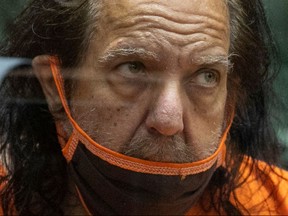 Adult film actor Ron Jeremy appears for his arraignment on rape and sexual assault charges at Clara Shortridge Foltz Criminal Justice Center on June 26, 2020 in Los Angeles, California. - Jeremy, whose real name is Ronald Jeremy Hyatt, is charged with raping three women and sexually assaulting another in separate incidents dating back to 2014. The 67-year-old defendant could face up to 90 years to life in state prison if convicted as charged. (Photo by David McNew / POOL / AFP) (Photo by DAVID MCNEW/POOL/AFP via Getty Images)