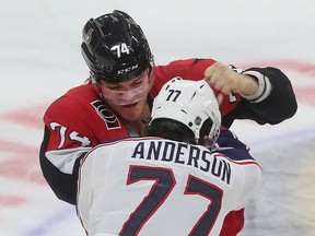 Senator’ Mark Borowiecki and Blue Jackets’ Josh Anderson fight during a game in December. Borowiecki, who will enter free agency next month, would certainly help the Leafs on the physicality front.
