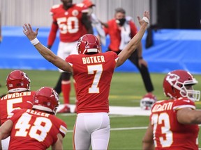 Kansas City Chiefs kicker Harrison Butker (7) celebrates with teammates after kicking the game-winning 58-yard field goal against the Los Angeles Chargers during overtime at SoFi Stadium on Sept. 20, 2020.