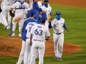 The Toronto Blue Jays celebrate a 11-5 win against the New York Yankees at Sahlen Field on September 21, 2020 in Buffalo, New York. The Blue Jays are the home team due to their stadium situation and the Canadian government's policy on the coronavirus.