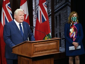 Premier Doug Ford makes an announcement with Health Minister Christine Elliott during the COVID-19 pandemic in Toronto on Thursday, September 24, 2020.